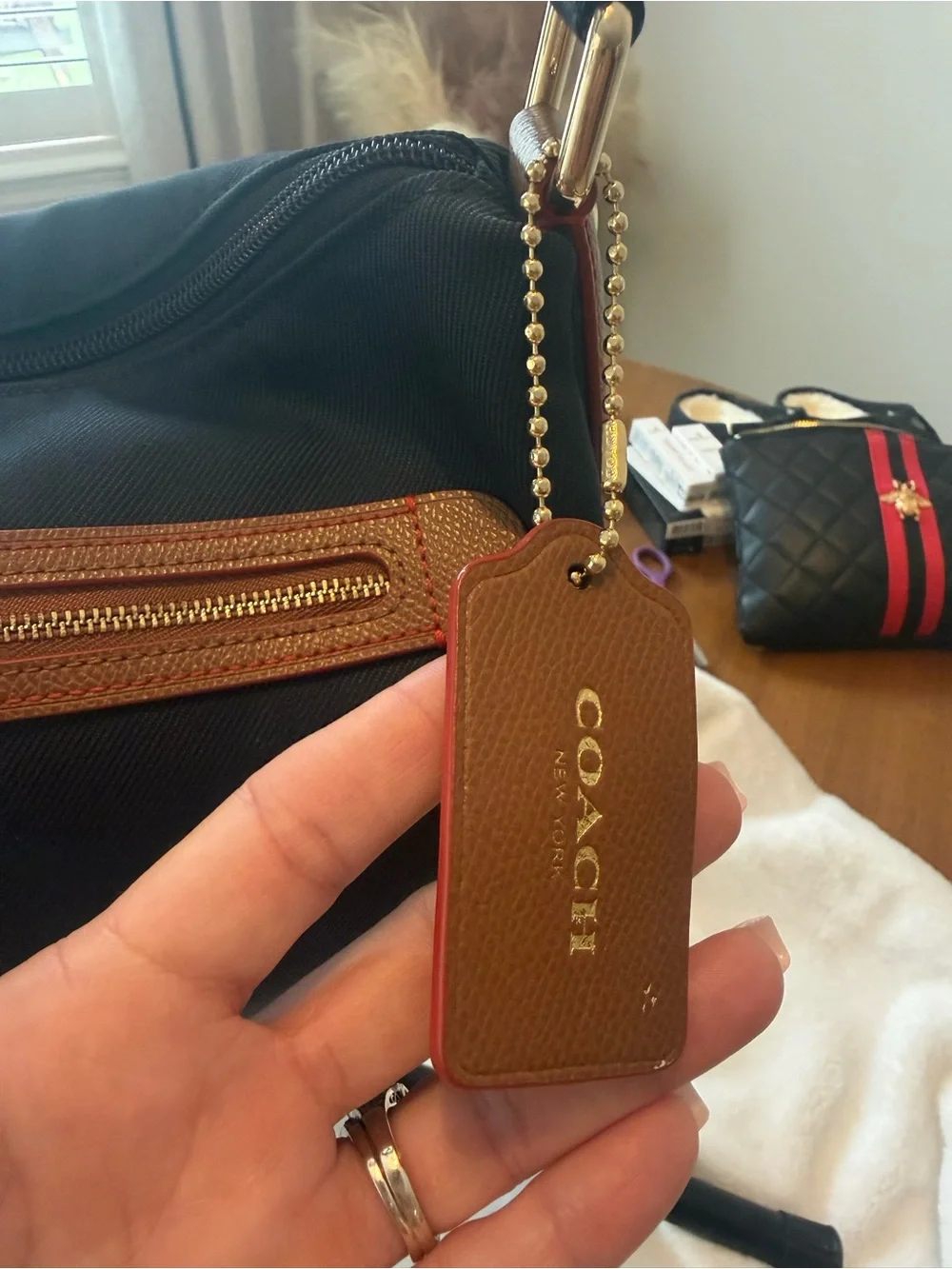 COACH Sawyer Navy Nylon Crossbody Bag with Tan leather Trim and red accents